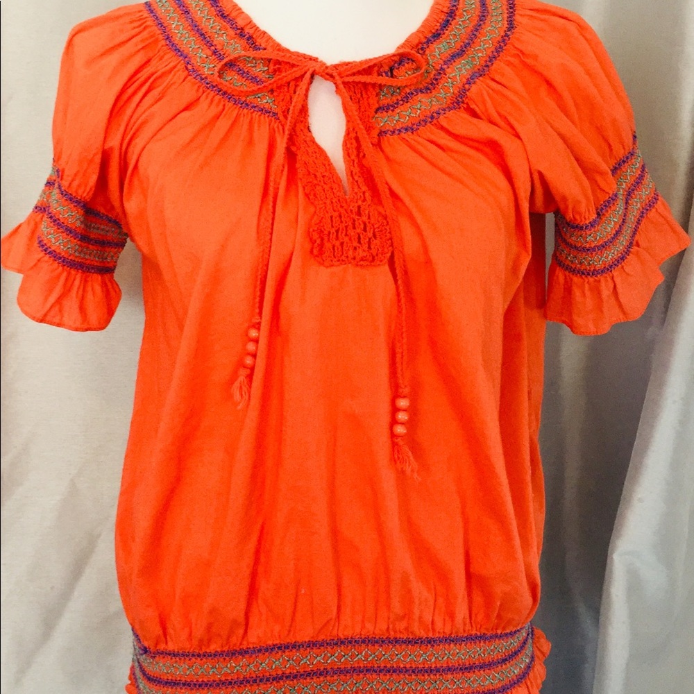 Apollo embroidery orange blouse made in India